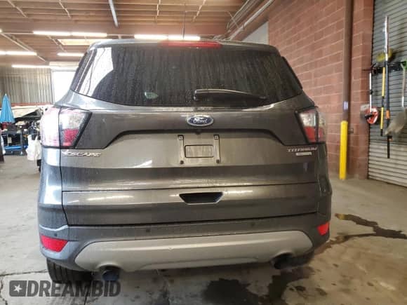 2017 Ford Escape Titanium with VIN 1FMCU0JD0HUE16388, listed as a Copart auction lot 86488065 with 120,964 mi miles and Clean title. Bid and sale history available at DreamBid. Image 6.