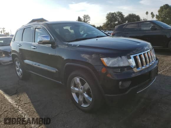 2012 Jeep Grand Cherokee Overland z VIN 1C4RJFCG2CC252898, wystawiony jako Copart lot #80726185 z przebiegiem 91 276 mil mil oraz Szkoda całkowita • Salvage title. Historia ofert i sprzedaży dostępna na DreamBid. Obrazek 4.