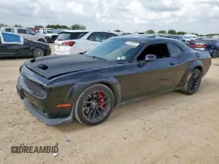 2019 Dodge Challenger R/T Scat Pack z VIN 2C3CDZFJ9KH679677, wystawiony jako Copart lot #63262875 z przebiegiem 56 863 mil mil oraz Szkoda całkowita • Salvage title. Historia ofert i sprzedaży dostępna na DreamBid. Obrazek 1.
