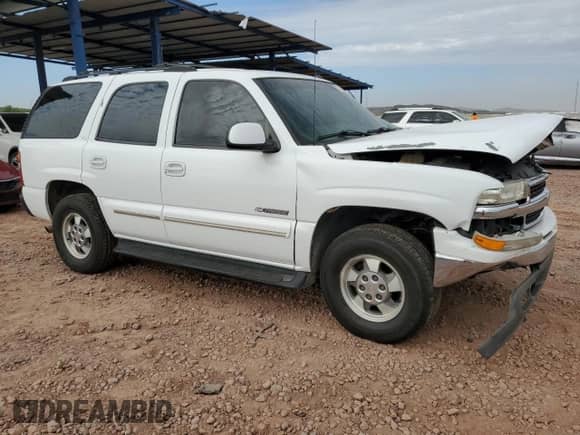 2003 Chevrolet Tahoe LS with VIN 1GNEC13Z63R109194, listed as a Copart auction lot 70428045 with 228,461 mi miles and Salvage title. Bid and sale history available at DreamBid. Image 4.