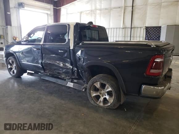 2021 Ram 1500 Laramie с VIN 1C6SRFJT4MN667387, выставлен на аукционе Copart как лот 61966205 с пробегом 28 921 миль миль и Списание • Salvage title. История ставок и продаж доступна на DreamBid. Изображение 2.