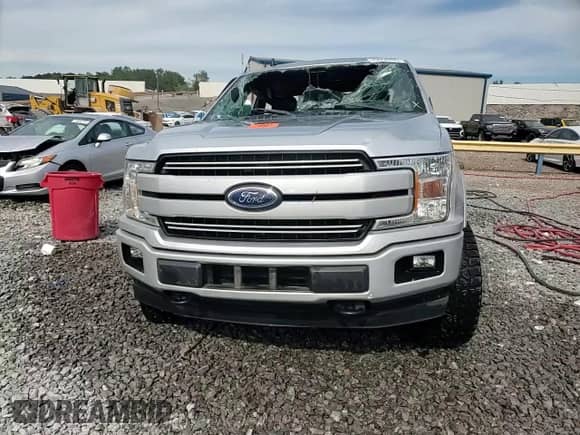 2019 Ford F-150 XL z VIN 1FTEW1E45KFB88195, wystawiony jako Copart lot #70554255 z przebiegiem Nie podano mil oraz Szkoda całkowita • Salvage title. Historia ofert i sprzedaży dostępna na DreamBid. Obrazek 13.