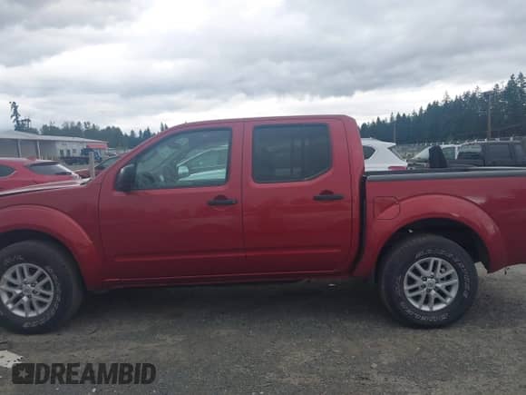 2014 Nissan Frontier SV z VIN 1N6AD0EV2EN723045, wystawiony jako IAAI lot #42624491 z przebiegiem 94 713 mil mil oraz . Historia ofert i sprzedaży dostępna na DreamBid. Obrazek 14.