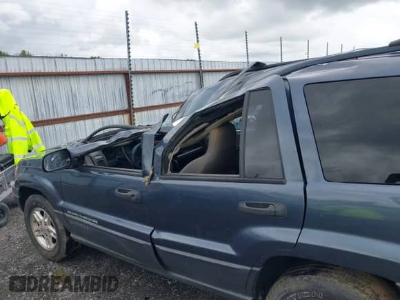 2004 Jeep Grand Cherokee Laredo with VIN 1J4GX48S34C213420, listed as a IAAI auction lot 42221769 with 194,163 mi miles and . Bid and sale history available at DreamBid. Image 13.
