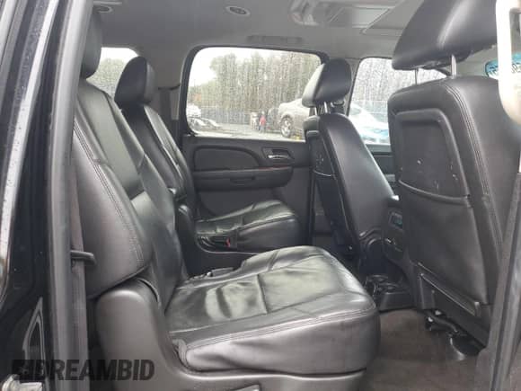 2012 Chevrolet Suburban LTZ z VIN 1GNSKKE74CR234444, wystawiony jako Copart lot #85596655 z przebiegiem 223 614 mil mil oraz Szkoda całkowita • Salvage title. Historia ofert i sprzedaży dostępna na DreamBid. Obrazek 11.