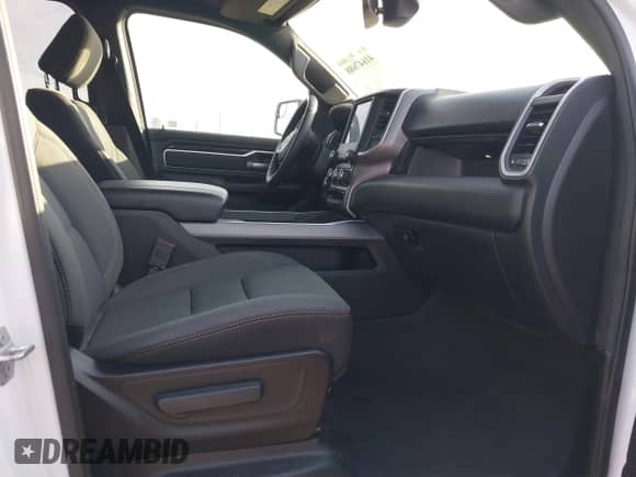 2023 Ram 1500 Lone Star z VIN 1C6RREBT8PN553095, wystawiony jako IAAI lot #41647688 z przebiegiem 18 574 mil mil oraz . Historia ofert i sprzedaży dostępna na DreamBid. Obrazek 5.