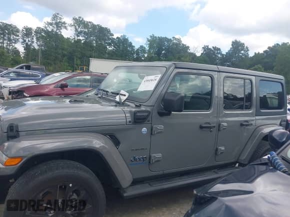 2023 Jeep Wrangler Sahara with VIN 1C4JJXP67PW641660, listed as a IAAI auction lot 43045618 with 53,182 mi miles and . Bid and sale history available at DreamBid. Image 14.