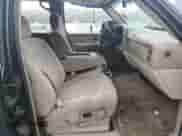 2002 Chevrolet Tahoe Z71 с VIN 1GNEK13Z52R325832, выставлен на аукционе Copart как лот 71494415 с пробегом Не указан миль и Списание • Salvage title. История ставок и продаж доступна на DreamBid. Изображение 7.