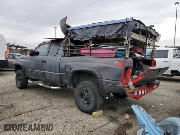1999 Dodge 1500 z VIN 3B7HF13Y7XG220802, wystawiony jako Copart lot #48341555 z przebiegiem 161 966 mil mil oraz Szkoda całkowita • Salvage title. Historia ofert i sprzedaży dostępna na DreamBid. Obrazek 2.
