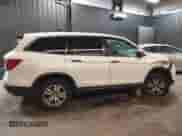 2018 Honda Pilot LX с VIN 5FNYF6H13JB066479, выставлен на аукционе IAAI как лот 41028041 с пробегом 162 331 миль миль и . История ставок и продаж доступна на DreamBid. Изображение 13.