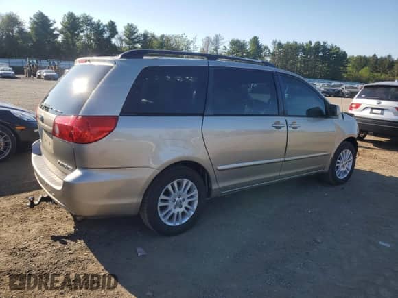 2009 Toyota Sienna XLE с VIN 5TDZK22C99S275803, выставлен на аукционе Copart как лот 80563085 с пробегом 136 403 миль миль и Списание • Salvage title. История ставок и продаж доступна на DreamBid. Изображение 3.