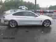 2015 BMW 4 Series 428i z VIN WBA3N3C55FK233180, wystawiony jako IAAI lot #42222285 z przebiegiem 190 073 mil mil oraz . Historia ofert i sprzedaży dostępna na DreamBid. Obrazek 14.