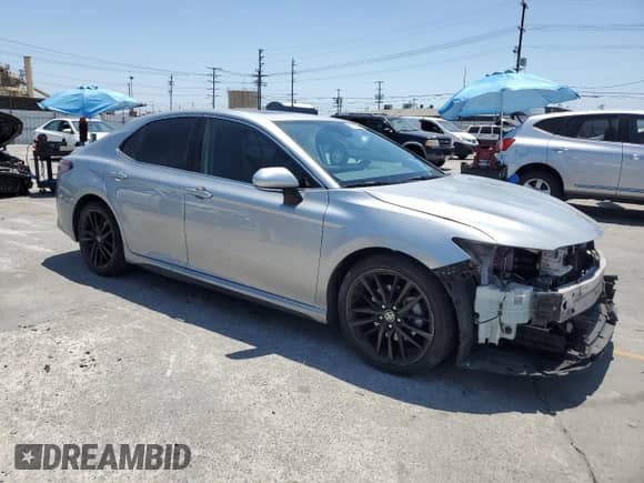 2022 Toyota Camry Hybrid XSE с VIN 4T1K31AK1NU036801, выставлен на аукционе Copart как лот 61826905 с пробегом 113 437 миль миль и Списание • Salvage title. История ставок и продаж доступна на DreamBid. Изображение 4.