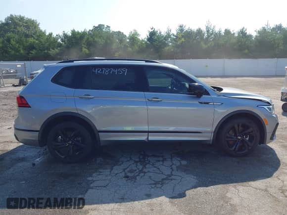 2023 Volkswagen Tiguan SE R-Line Black с VIN 3VVCB7AX2PM055070, выставлен на аукционе IAAI как лот 42787459 с пробегом 88 798 миль миль и . История ставок и продаж доступна на DreamBid. Изображение 13.