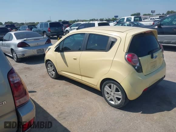 2014 Chevrolet Spark LT z VIN KL8CD6S92EC430126, wystawiony jako IAAI lot #43175376 z przebiegiem 77 774 mil mil oraz . Historia ofert i sprzedaży dostępna na DreamBid. Obrazek 3.