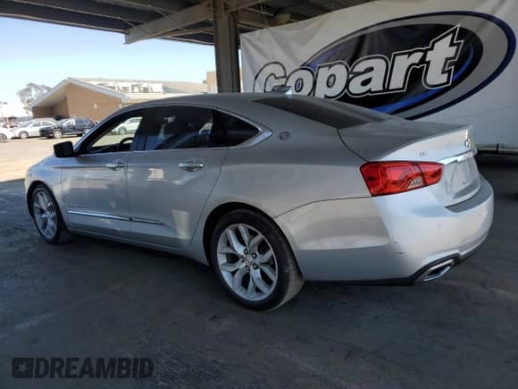 2018 Chevrolet Impala Premier с VIN 2G1125S3XJ9148658, выставлен на аукционе Copart как лот 70948825 с пробегом 133 512 миль миль и Списание • Salvage title. История ставок и продаж доступна на DreamBid. Изображение 2.