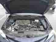 2021 Toyota Camry Hybrid XLE with VIN 4T1F31AK4MU546558, listed as a IAAI auction lot 42235763 with 62,299 mi miles and . Bid and sale history available at DreamBid. Image 10.