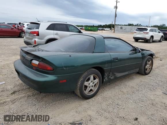 1997 Chevrolet Camaro Z28 z VIN 2G1FP22P6V2156828, wystawiony jako Copart lot #57651625 z przebiegiem 131 803 mil mil oraz Szkoda całkowita • Salvage title. Historia ofert i sprzedaży dostępna na DreamBid. Obrazek 3.