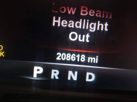 2015 Ram 1500 Laramie Limited with VIN 1C6RR7WM9FS641989, listed as a IAAI auction lot 42145348 with 208,618 mi miles and . Bid and sale history available at DreamBid. Image 15.