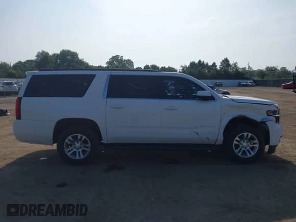 2020 Chevrolet Suburban LT with VIN 1GNSKHKC9LR198576, listed as a IAAI auction lot 42498041 with 81,668 mi miles and . Bid and sale history available at DreamBid. Image 13.