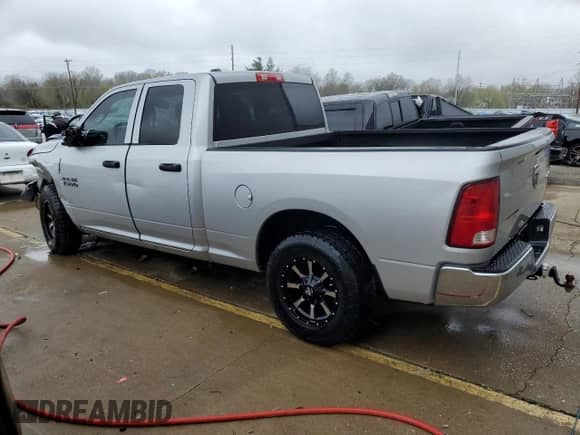 2014 Ram 1500 Tradesman with VIN 1C6RR7FG1ES204657, listed as a Copart auction lot 50946195 with 112,572 mi miles and Salvage title. Bid and sale history available at DreamBid. Image 2.