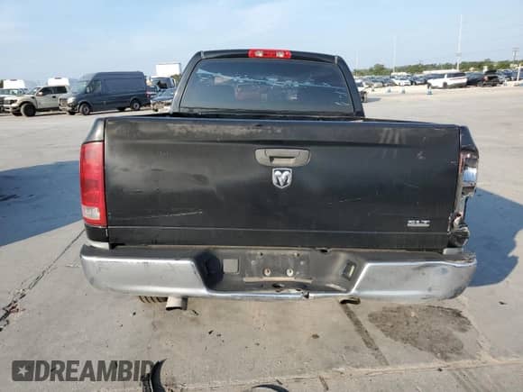 2005 Dodge 1500 SLT z VIN 1D7HA18N65S210786, wystawiony jako Copart lot #67089554 z przebiegiem 293 668 mil mil oraz Szkoda całkowita • Salvage title. Historia ofert i sprzedaży dostępna na DreamBid. Obrazek 6.