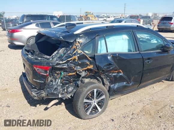 2020 Subaru Impreza Premium with VIN 4S3GTAD67L3712955, listed as a IAAI auction lot 42668679 with 69,300 mi miles and . Bid and sale history available at DreamBid. Image 18.