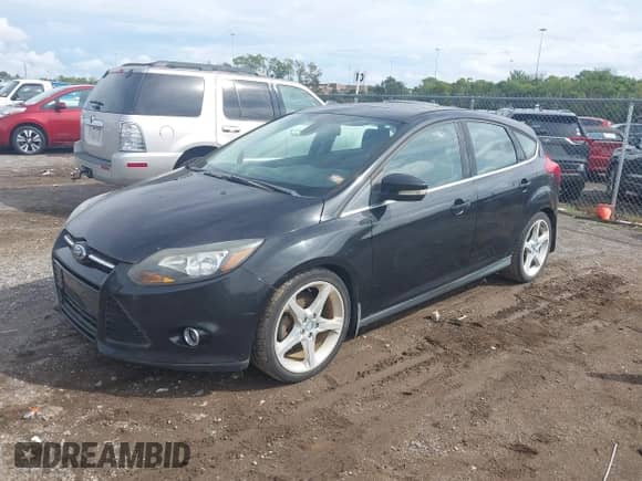 2012 Ford Focus Titanium с VIN 1FAHP3N29CL149221, выставлен на аукционе IAAI как лот 43300152 с пробегом 185 943 миль миль и . История ставок и продаж доступна на DreamBid. Изображение 2.