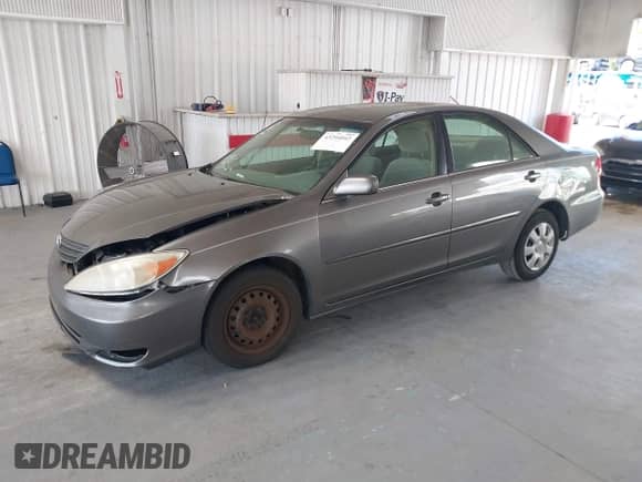 2003 Toyota Camry LE with VIN JTDBE32K630154792, listed as a IAAI auction lot 43294042 with 123,134 mi miles and . Bid and sale history available at DreamBid. Image 2.