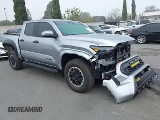 2024 Toyota Tacoma SR5 with VIN 3TMLB5JN6RM022612, listed as a IAAI auction lot 41611378 with 7,275 mi miles and . Bid and sale history available at DreamBid. Image 1.