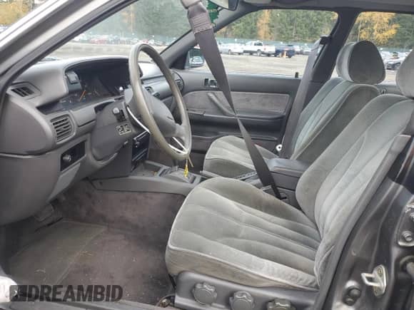 1988 Toyota Camry LE z VIN JT2SV22E0J0237998, wystawiony jako Copart lot #78850584 z przebiegiem 165 880 mil mil oraz Szkoda całkowita • Salvage title. Historia ofert i sprzedaży dostępna na DreamBid. Obrazek 7.