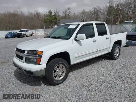 2011 Chevrolet Colorado 1LT z VIN 1GCHTCFE6B8141559, wystawiony jako IAAI lot #41812559 z przebiegiem 147 848 mil mil oraz . Historia ofert i sprzedaży dostępna na DreamBid. Obrazek 2.
