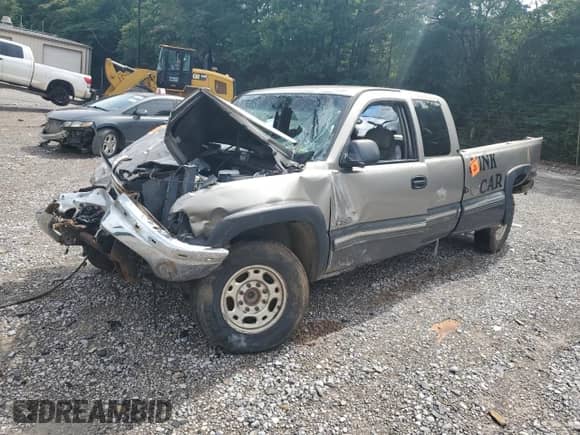 2000 Chevrolet Silverado 2500 LS с VIN 1GCGC29UXYE399084, выставлен на аукционе Copart как лот 58577555 с пробегом Не указан миль и Списание • Salvage title. История ставок и продаж доступна на DreamBid. Изображение 1.