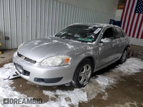2012 Chevrolet Impala Police Police with VIN 2G1WD5E3XC1283653, listed as a Copart auction lot 87286694 with 150,867 mi miles and Salvage title. Bid and sale history available at DreamBid. Image 1.