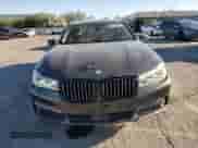 2016 BMW 7 Series 750i xDrive with VIN WBA7F2C5XGG415521, listed as a Copart auction lot 80483505 with 128,509 mi miles and Salvage title. Bid and sale history available at DreamBid. Image 5.