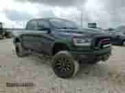 2020 Ram 1500 Rebel z VIN 1C6SRFLT6LN127034, wystawiony jako Copart lot #64791005 z przebiegiem 86 689 mil mil oraz Szkoda całkowita • Salvage title. Historia ofert i sprzedaży dostępna na DreamBid. Obrazek 13.
