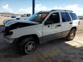 2003 Jeep Grand Cherokee Laredo z VIN 1J4GX48S53C518626, wystawiony jako Copart lot #71123695 z przebiegiem 196 154 mil mil oraz Szkoda całkowita • Salvage title. Historia ofert i sprzedaży dostępna na DreamBid. Obrazek 1.