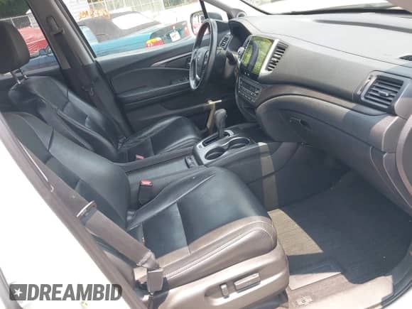 2017 Honda Pilot EX-L with VIN 5FNYF5H56HB003982, listed as a IAAI auction lot 42402297 with 99,485 mi miles and . Bid and sale history available at DreamBid. Image 5.