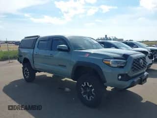 2023 Toyota Tacoma SR z VIN 3TYCZ5AN7PT110341, wystawiony jako IAAI lot #43170521 z przebiegiem 35 979 mil mil oraz . Historia ofert i sprzedaży dostępna na DreamBid. Obrazek 1.