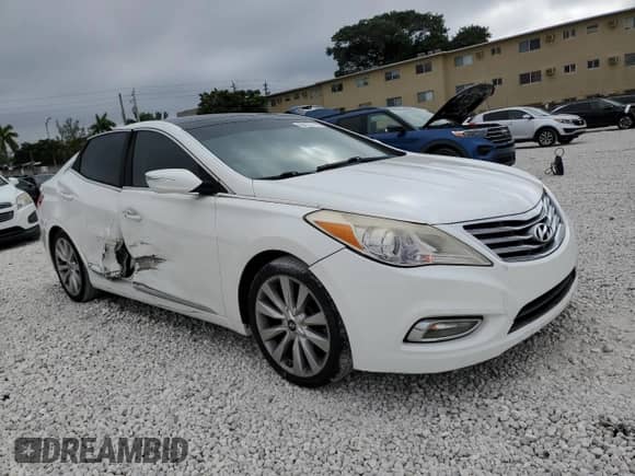 2014 Hyundai Azera Limited с VIN KMHFH4JG1EA377889, выставлен на аукционе Copart как лот 88479775 с пробегом 95 212 миль миль и Списание • Salvage title. История ставок и продаж доступна на DreamBid. Изображение 4.