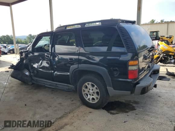 2005 Chevrolet Tahoe Z71 with VIN 1GNEK13T35R204801, listed as a Copart auction lot 67280045 with 427,990 mi miles and Salvage title. Bid and sale history available at DreamBid. Image 2.