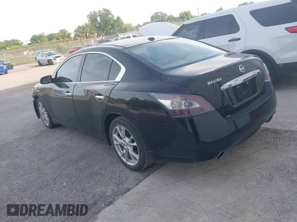 2014 Nissan Maxima SV z VIN 1N4AA5AP6EC483001, wystawiony jako IAAI lot #42648393 z przebiegiem 69 592 mil mil oraz . Historia ofert i sprzedaży dostępna na DreamBid. Obrazek 3.