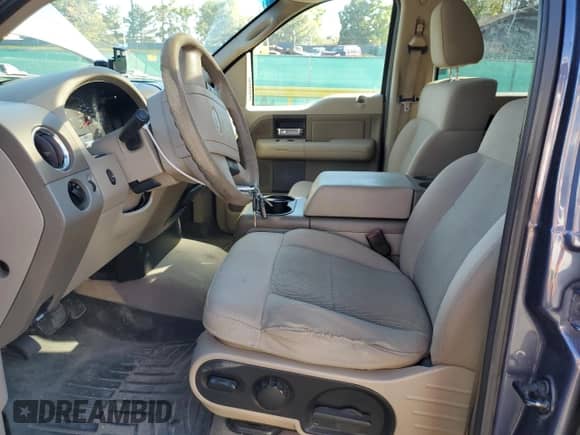 2005 Ford F-150 XLT with VIN 1FTPW14515FB04316, listed as a Copart auction lot 82360495 with 175,738 mi miles and Salvage title. Bid and sale history available at DreamBid. Image 7.