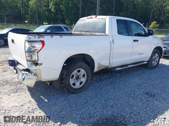 2012 Toyota Tundra z VIN 5TFRU5F15CX026386, wystawiony jako IAAI lot #42588467 z przebiegiem 256 381 mil mil oraz . Historia ofert i sprzedaży dostępna na DreamBid. Obrazek 4.