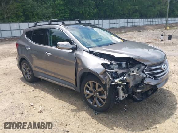 2018 Hyundai Santa Fe Ultimate with VIN 5NMZW4LAXJH069328, listed as a IAAI auction lot 42487378 with 51,859 mi miles and . Bid and sale history available at DreamBid. Image 1.