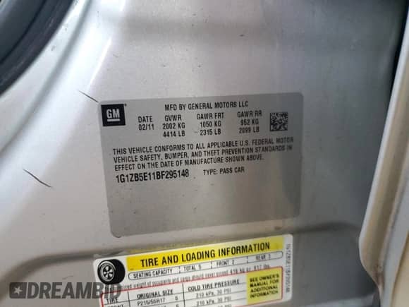 2011 Chevrolet Malibu 1LS z VIN 1G1ZB5E11BF295148, wystawiony jako Copart lot #62186085 z przebiegiem 176 485 mil mil oraz Szkoda całkowita • Salvage title. Historia ofert i sprzedaży dostępna na DreamBid. Obrazek 12.