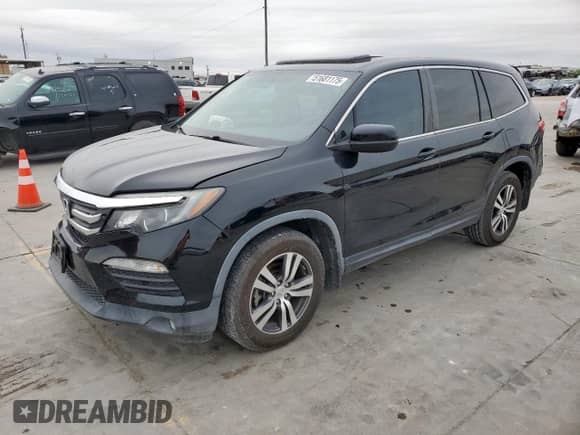 2017 Honda Pilot EX-L with VIN 5FNYF5H84HB005790, listed as a Copart auction lot 51681175 with 91,937 mi miles and Salvage title. Bid and sale history available at DreamBid. Image 1.