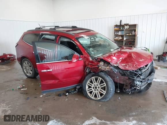 2013 Chevrolet Traverse LT z VIN 1GNKVGKD2DJ123860, wystawiony jako IAAI lot #42683933 z przebiegiem 182 801 mil mil oraz . Historia ofert i sprzedaży dostępna na DreamBid. Obrazek 1.