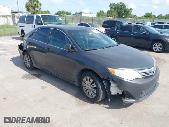 2012 Toyota Camry L z VIN 4T1BF1FK2CU579104, wystawiony jako IAAI lot #42604270 z przebiegiem 231 676 mil mil oraz . Historia ofert i sprzedaży dostępna na DreamBid. Obrazek 1.