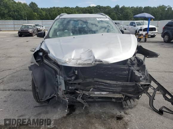 2014 Chevrolet Traverse LS с VIN 1GNKRFKD2EJ349865, выставлен на аукционе Copart как лот 67515875 с пробегом 143 968 миль миль и Списание • Salvage title. История ставок и продаж доступна на DreamBid. Изображение 5.